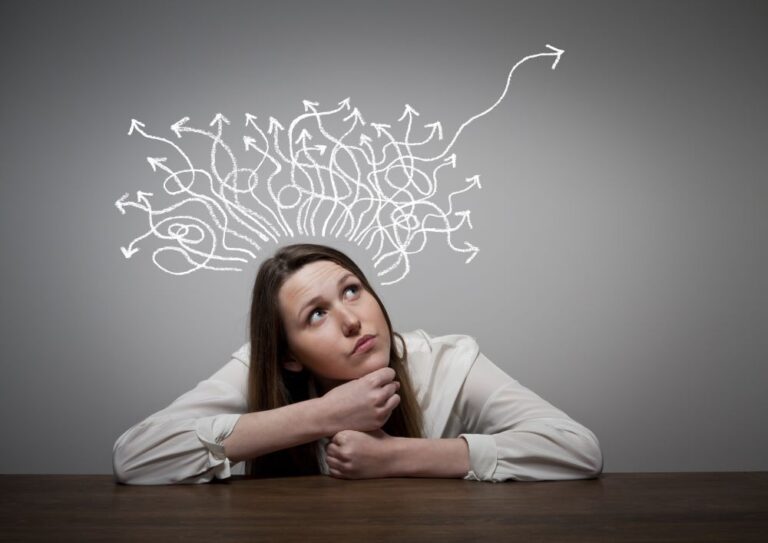 A student sits and solves a problem.